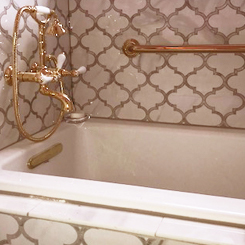 Polarstone quartz bathtub in Rock Hill Antonia Arabesque Bathroom