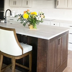 Yorktown cherry smoked island cabinets in Cobble Ridge Kitchen