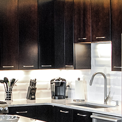 Custom dark wood kitchen cabinets