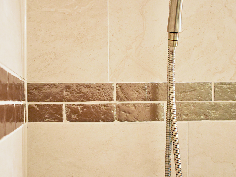 Wow copper accent tile in shower